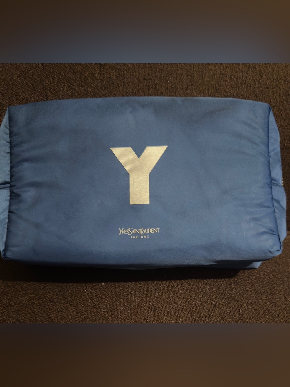 Yves Saint Laurent Blue 'Y' Travel Pouch. 8”W x 6”L. Good condition.
